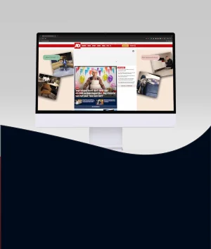 Advertentie van Piet Klerkx rondom een nieuwspagina van AD.nl, op een monitor